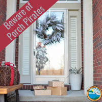 An image of some packages by a front door. Text says "Beware of Porch Pirates"