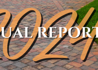 annual report title over entrance monument